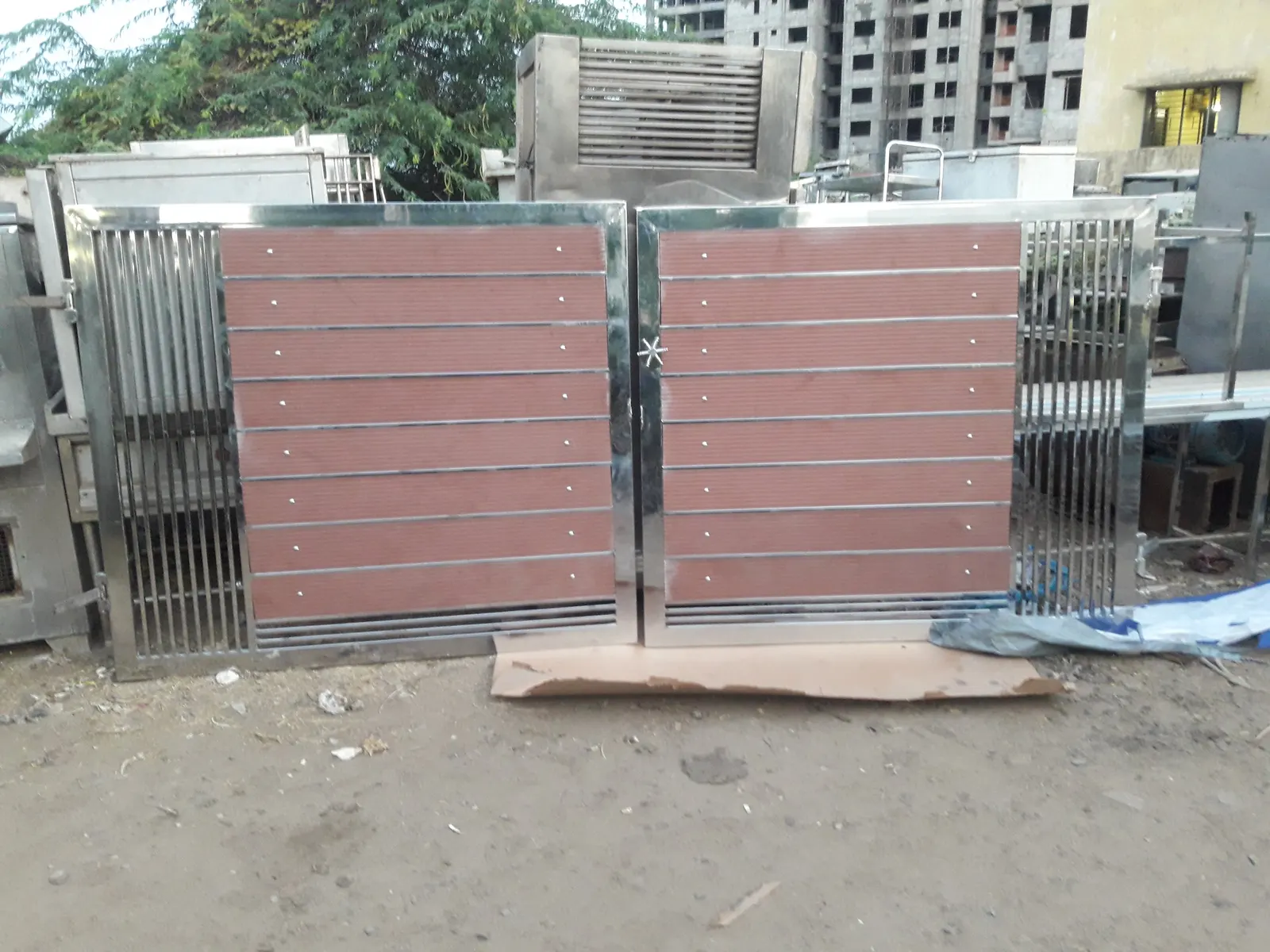 Stainless steel gate with infill panels fabricated for a site installation